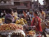 Kathmandu Durbar Square 04 03 Maru Tole Market Vendors sell fruit, vegetables, and flowers in Maru Tole at the southwestern corner of the Kathmandu Durbar Square.